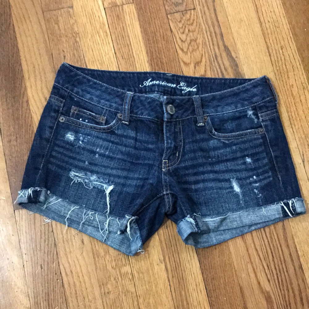 Dark distressed jean shorts